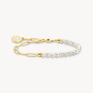 Thomas Sabo Charm-armband med vita sötvattens pärlor. Guld förgyllt. 1 ex