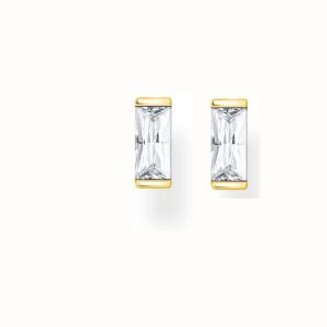 Thomas Sabo- små Örhängen med vit sten guldpläterat silver. Baguette. 1 par